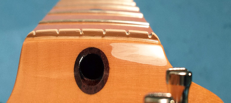 Réglage du sillet de la guitare